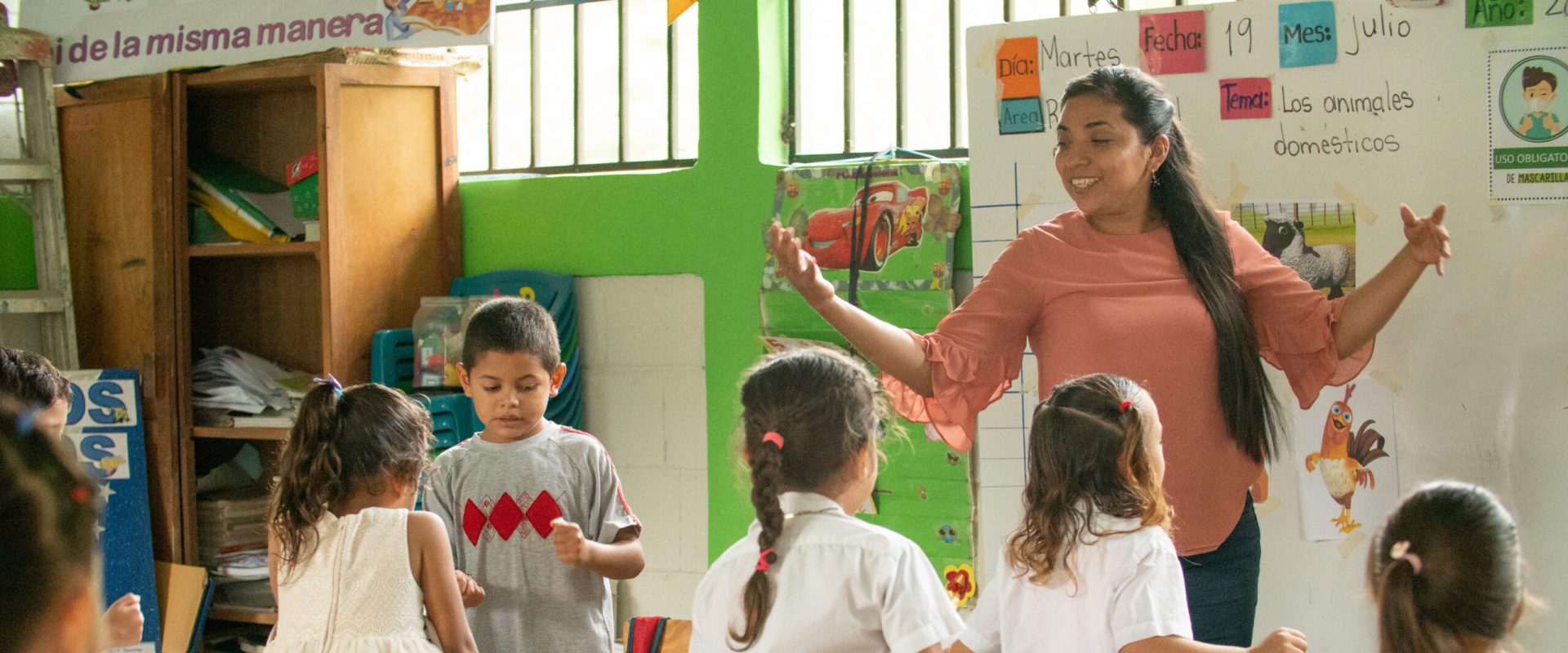 Tutor in Honduras working on math and reading skills