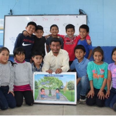 Teacher Juan appreciates the transformation when a new classroom provides clean, bright, and safe environment for teaching.